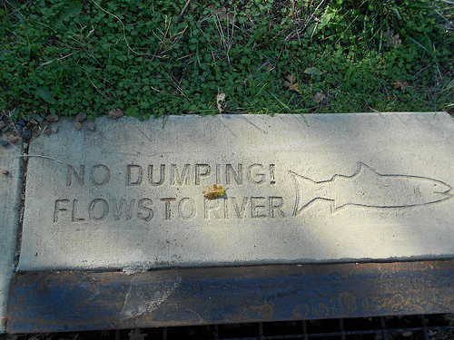 Sign at the storm drain