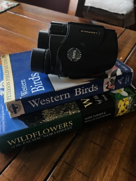 field guides and binoculars